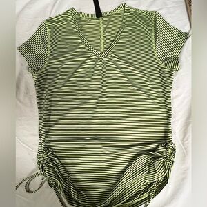 RBX ACTIVE WEAR ALL IN RUCHED TEE. SIZE XL LIME GREEN/ BLACK STRIPED
